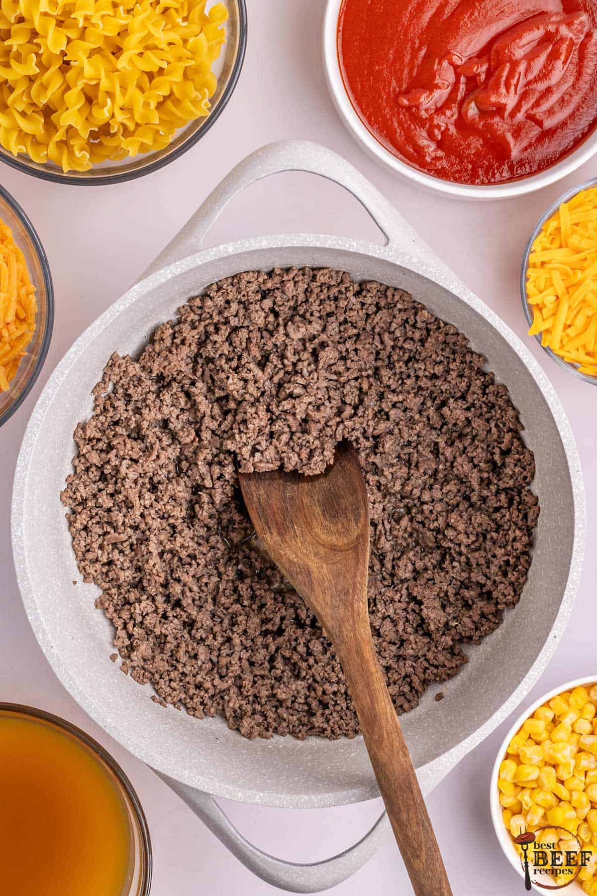 the ground beef browned in a pan