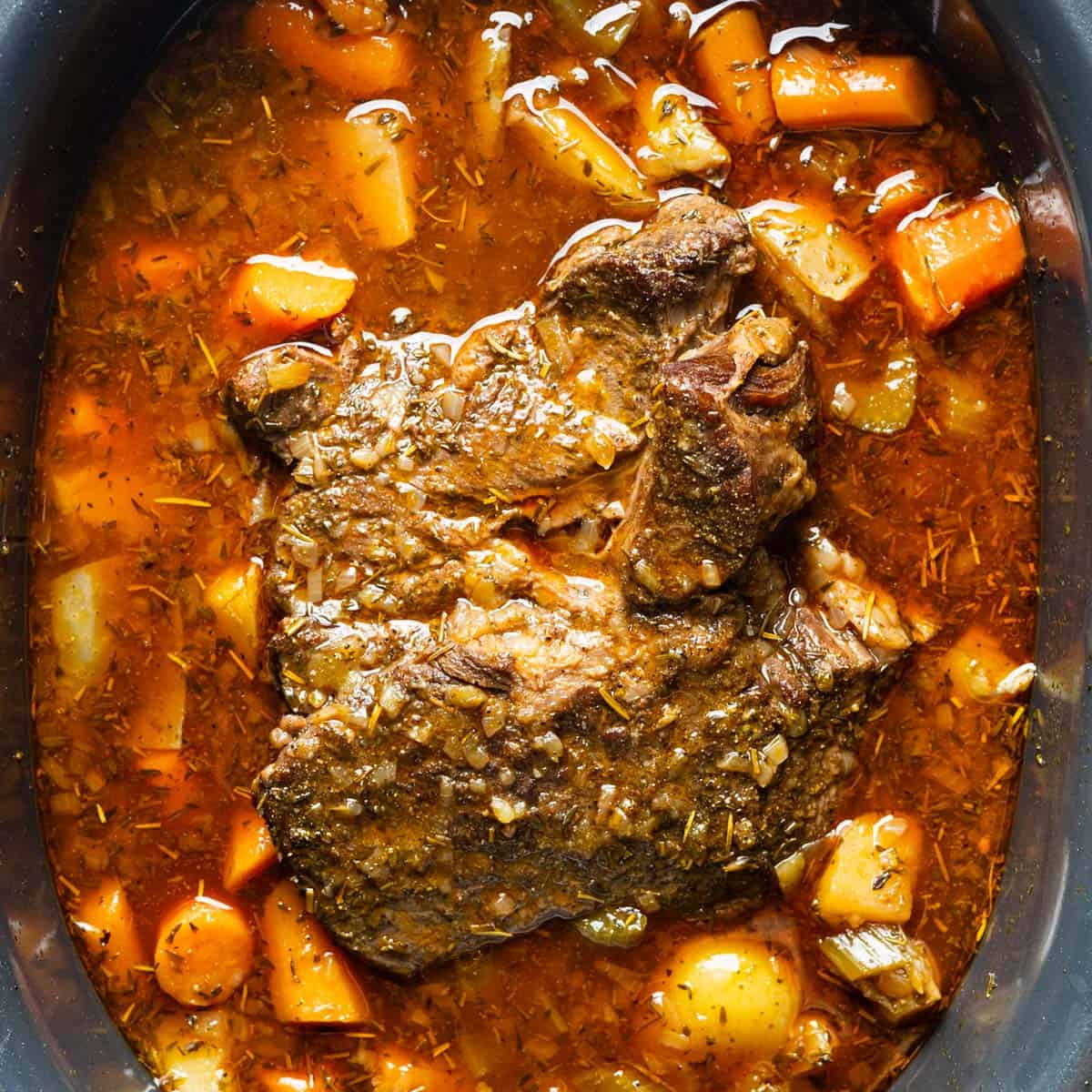 roast beef in the slow cooker with carrots and potatoes