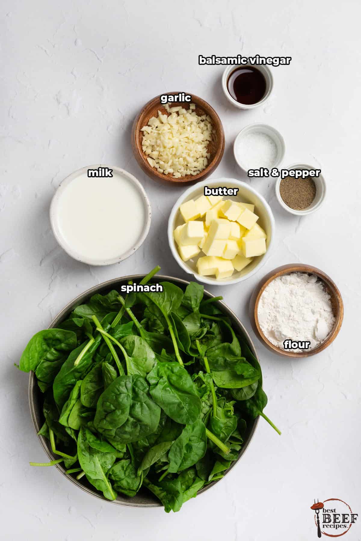 all the ingredients for creamed spinach with labels