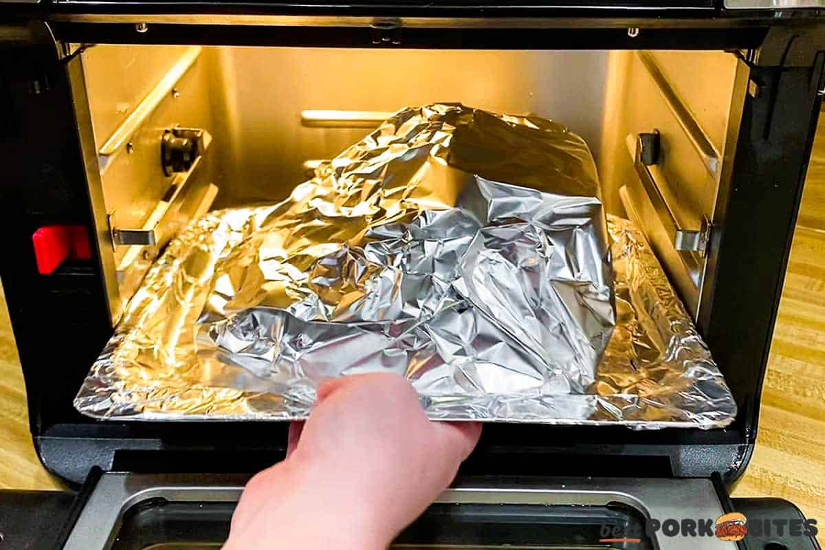 placing ham in air fryer wrapped in foil