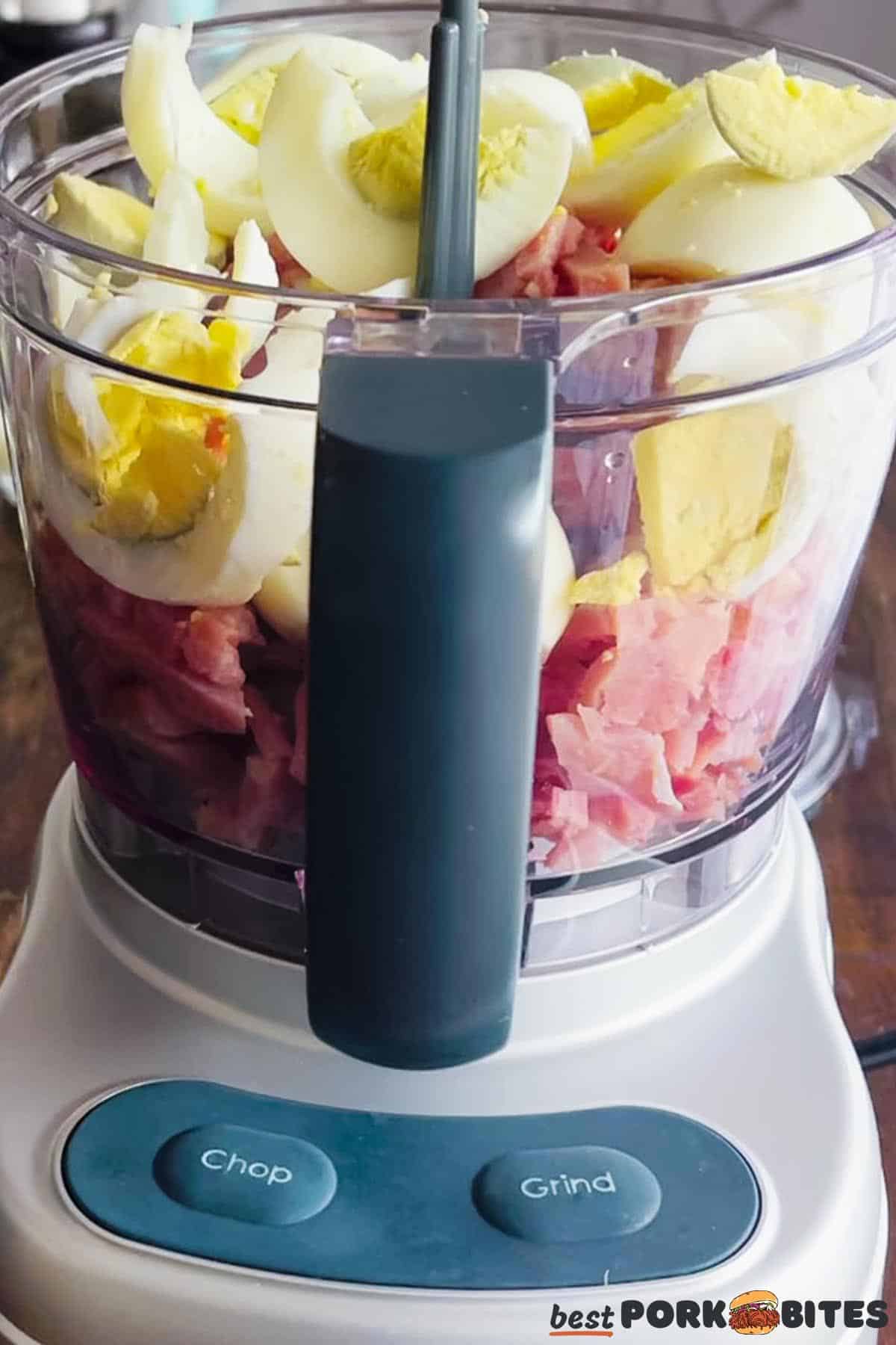 ham and hard boiled eggs in a blender before being blended