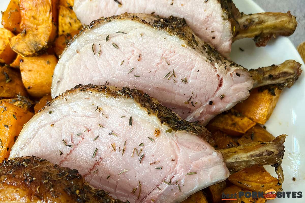 slices of pork rib roast on a white plate