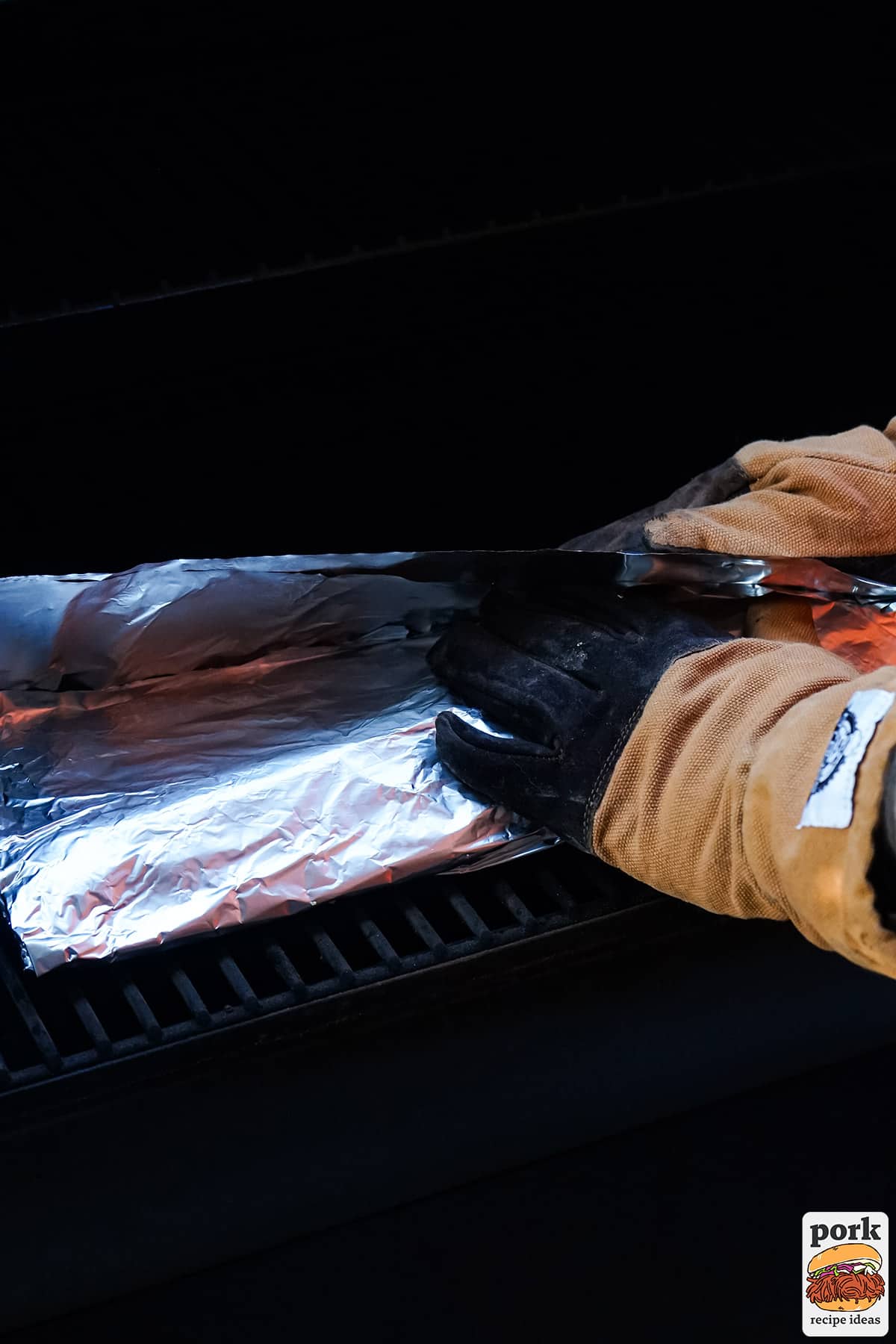ribs being wrapped in foil