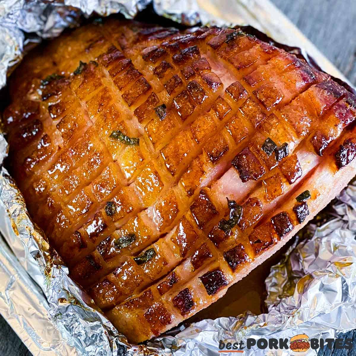 sliced air fryer ham on a tray with foil
