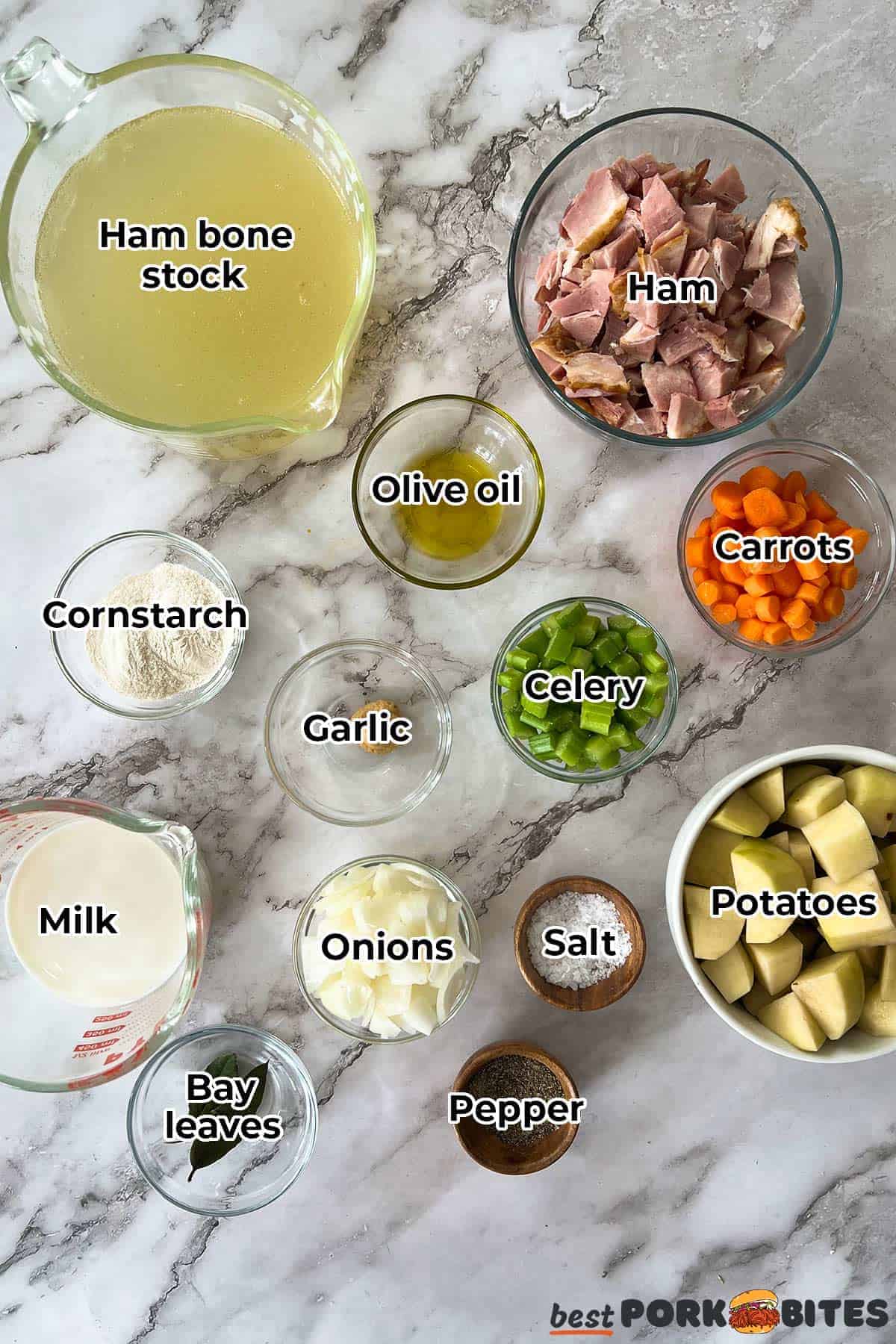 the ingredients for ham bone soup in separate bowls with labels