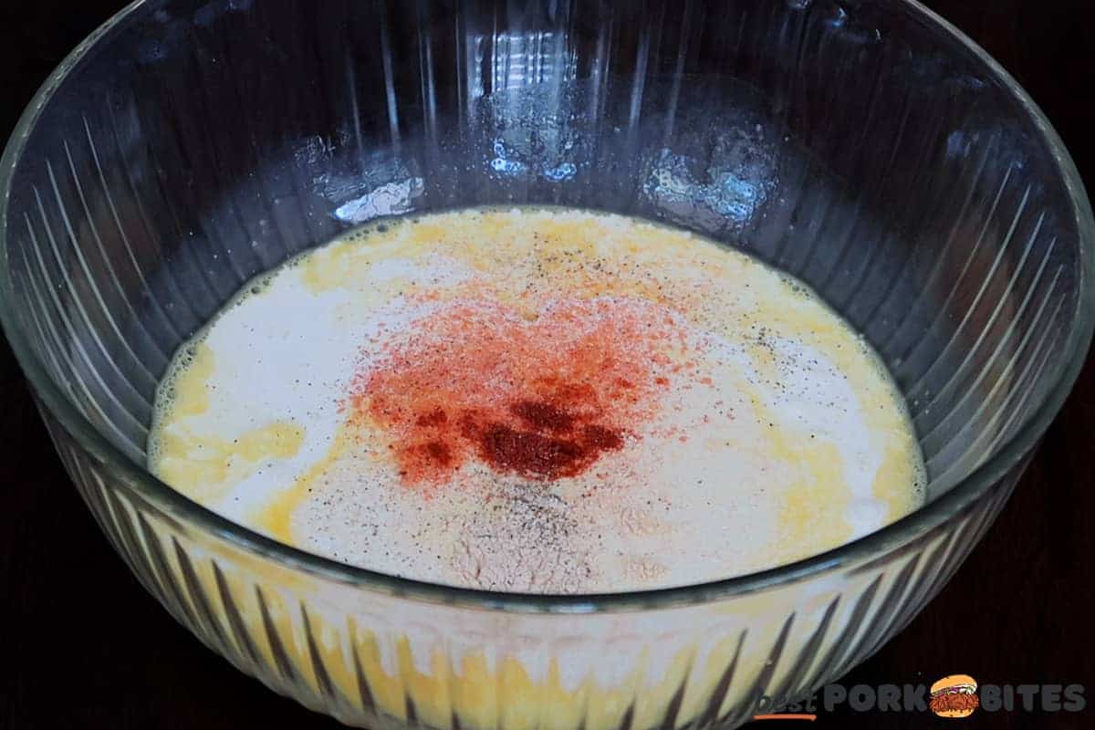 mixing the egg mixture for ham quiche