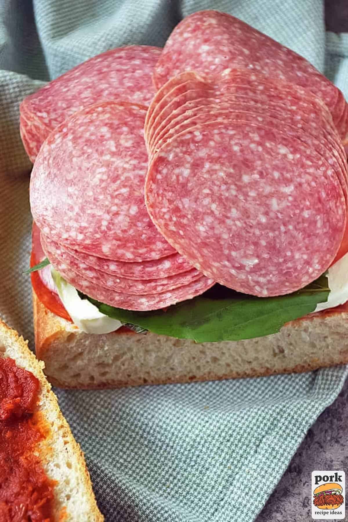 the salami added to the sandwich