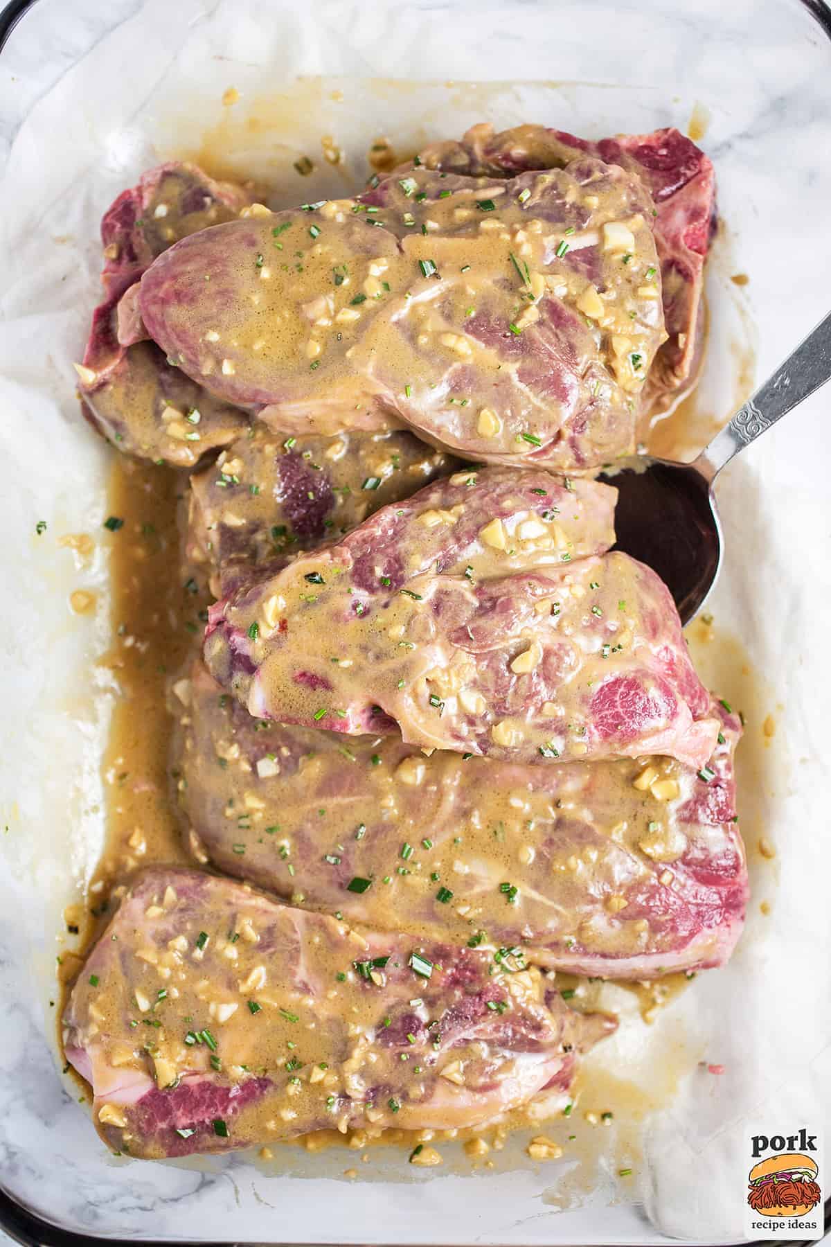 lamb chops marinating in the same pork chop marinade