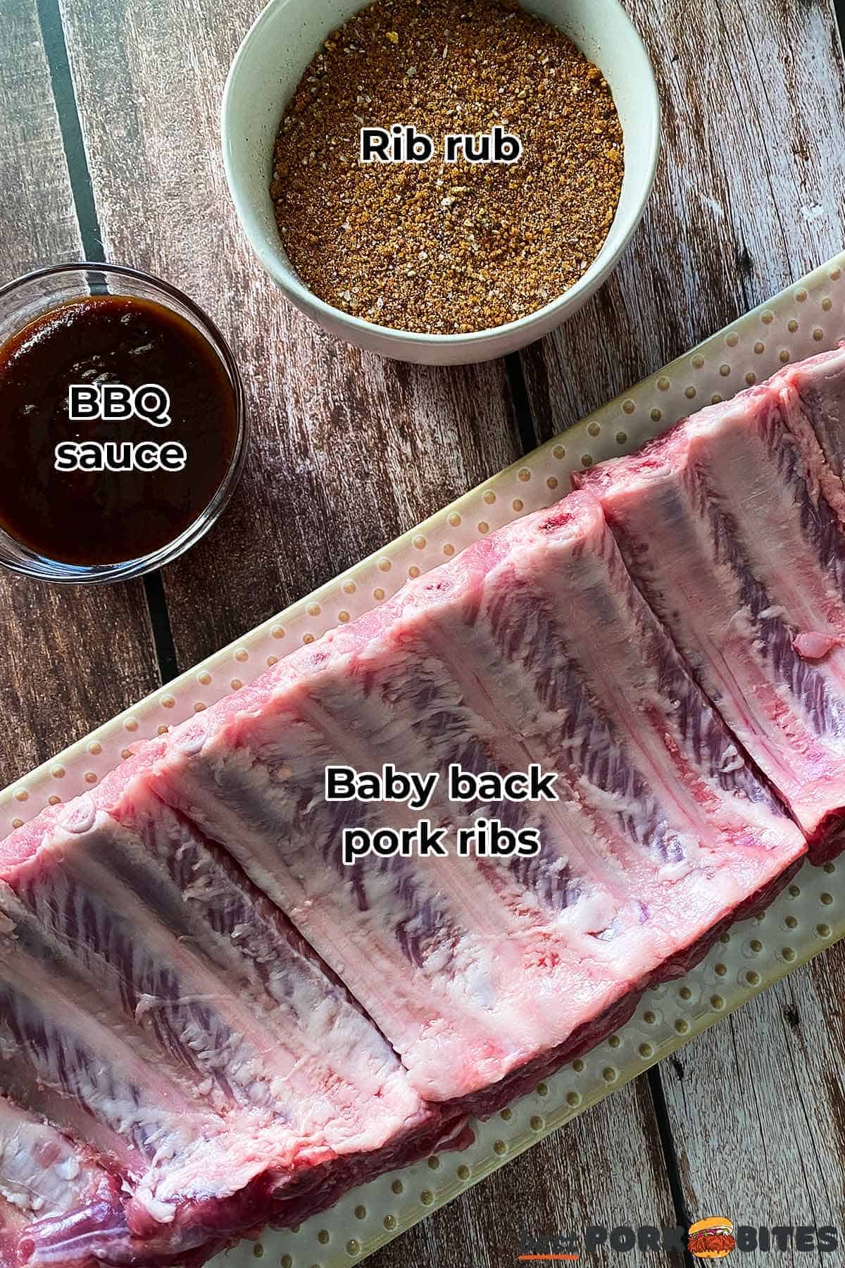 the ingredients for air fryer pork ribs separated out with labels