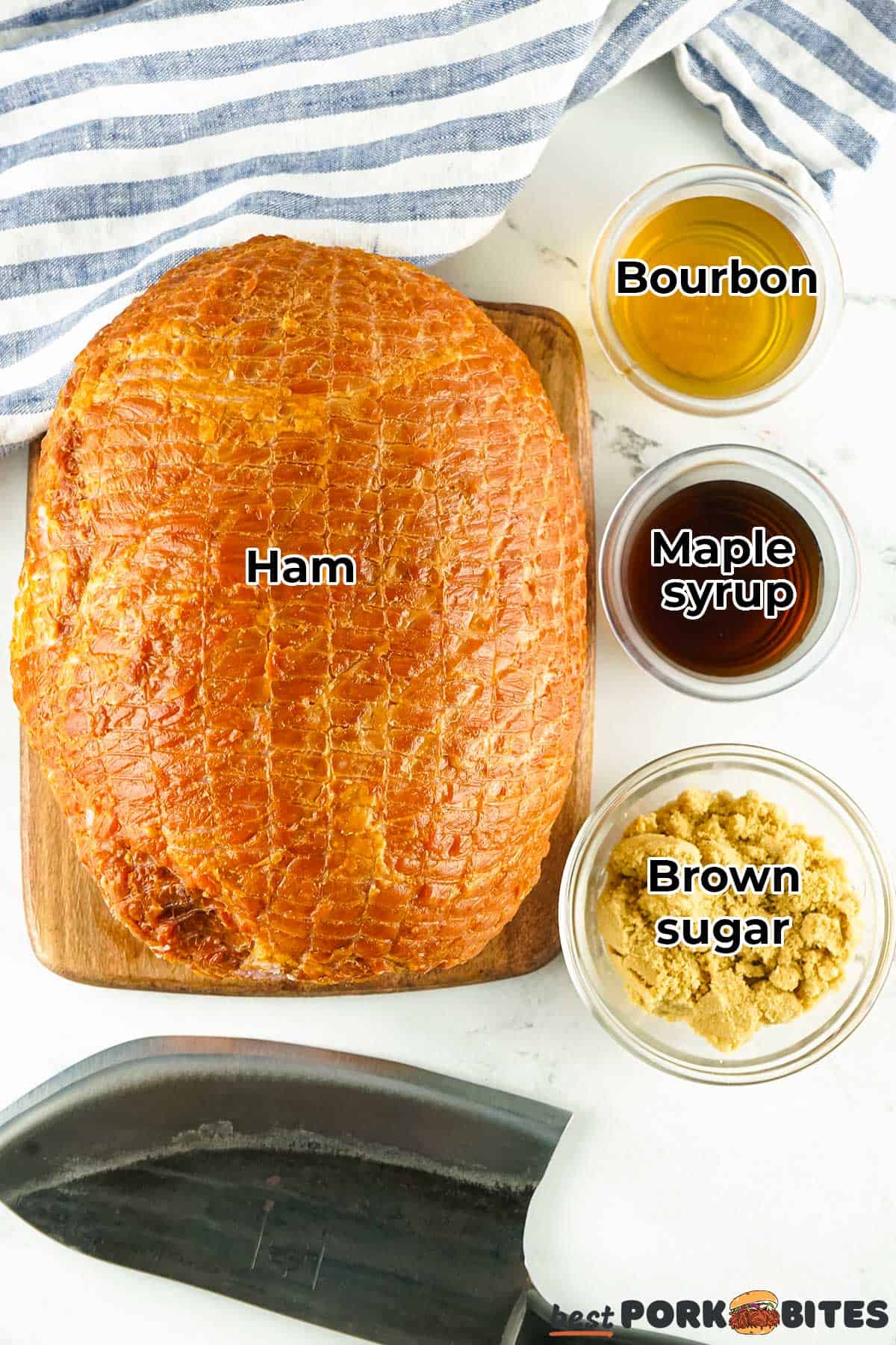 the ingredients for smoked ham in separate bowls with labels on a counter with a towel and a knife