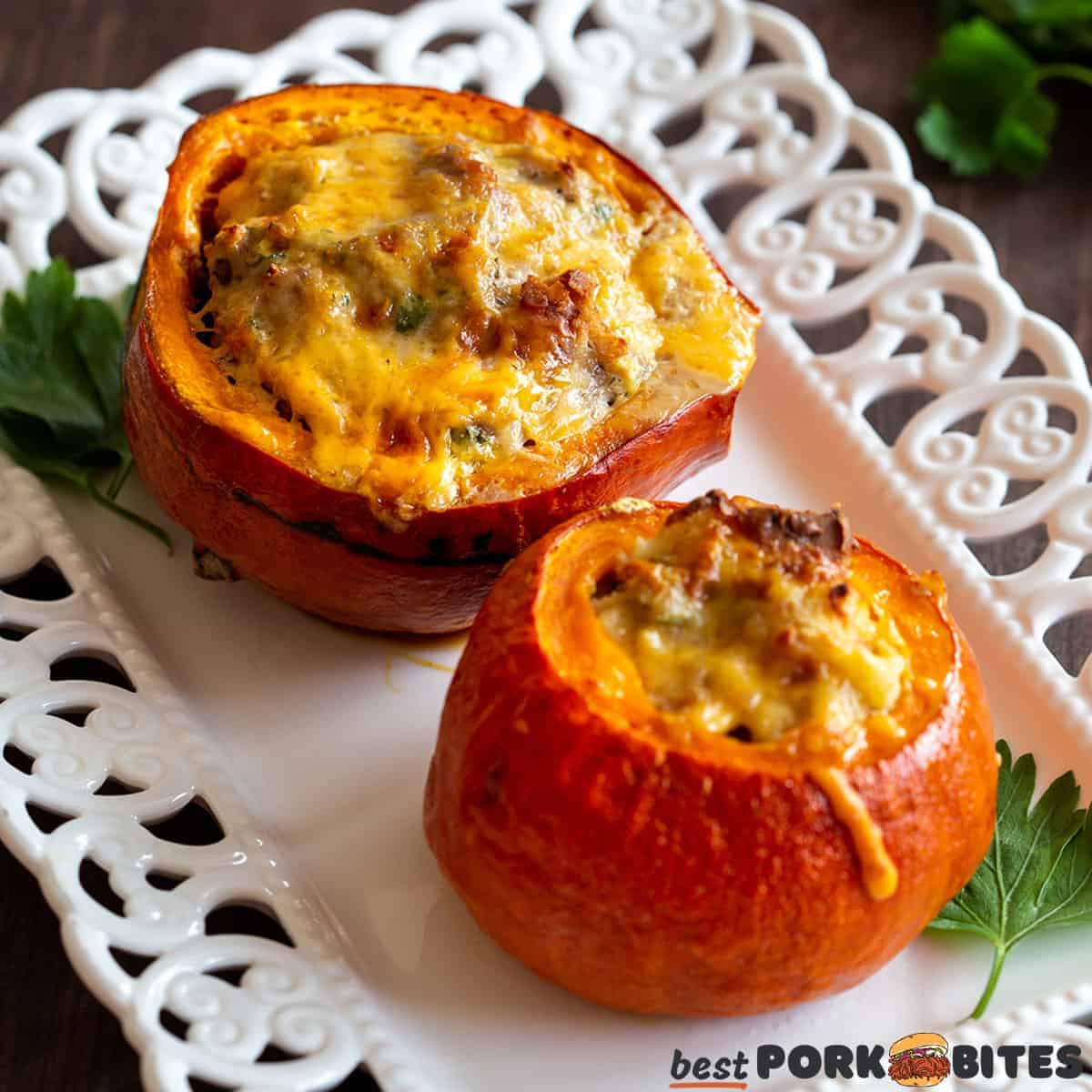 two baked stuffed squash on a white serving dish with parsley